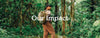 Akash walking through the jungle with a backpack on. He is helping wildlife with the Fable Fund. 